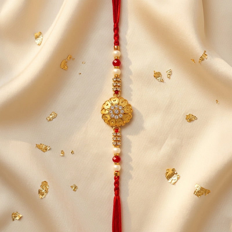 Gold Floral Kundan Rakhi with Ruby & Pearl Beads