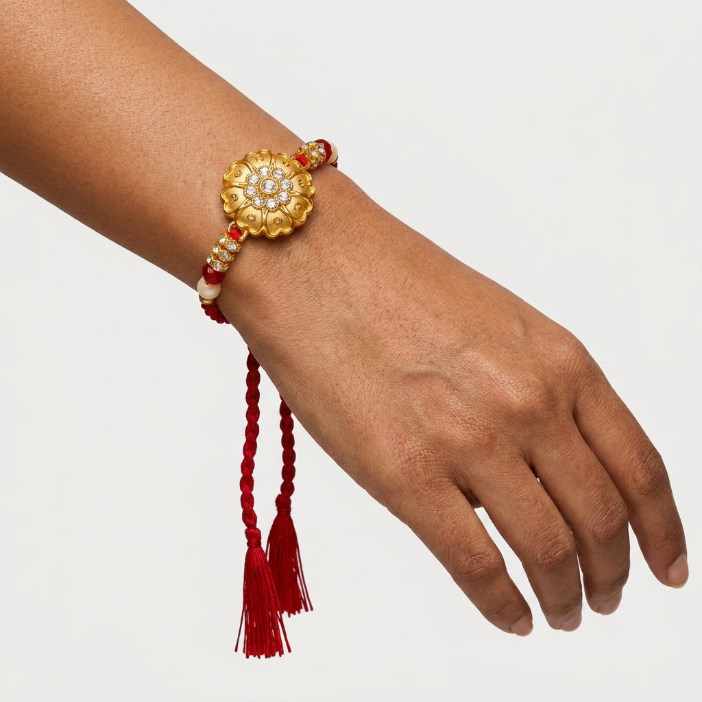 Gold Floral Kundan Rakhi with Ruby & Pearl Beads